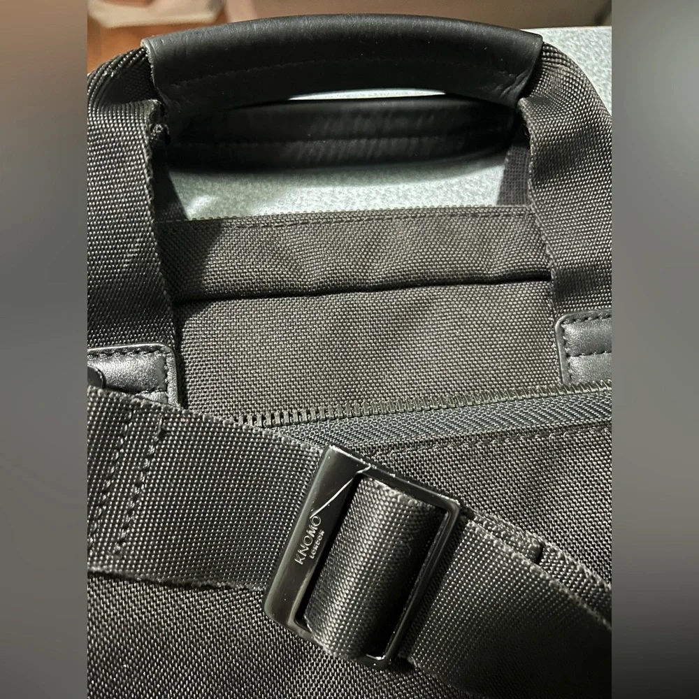 KNOMO Black Unisex Laptop Briefcase Messenger Bag with many compartments.